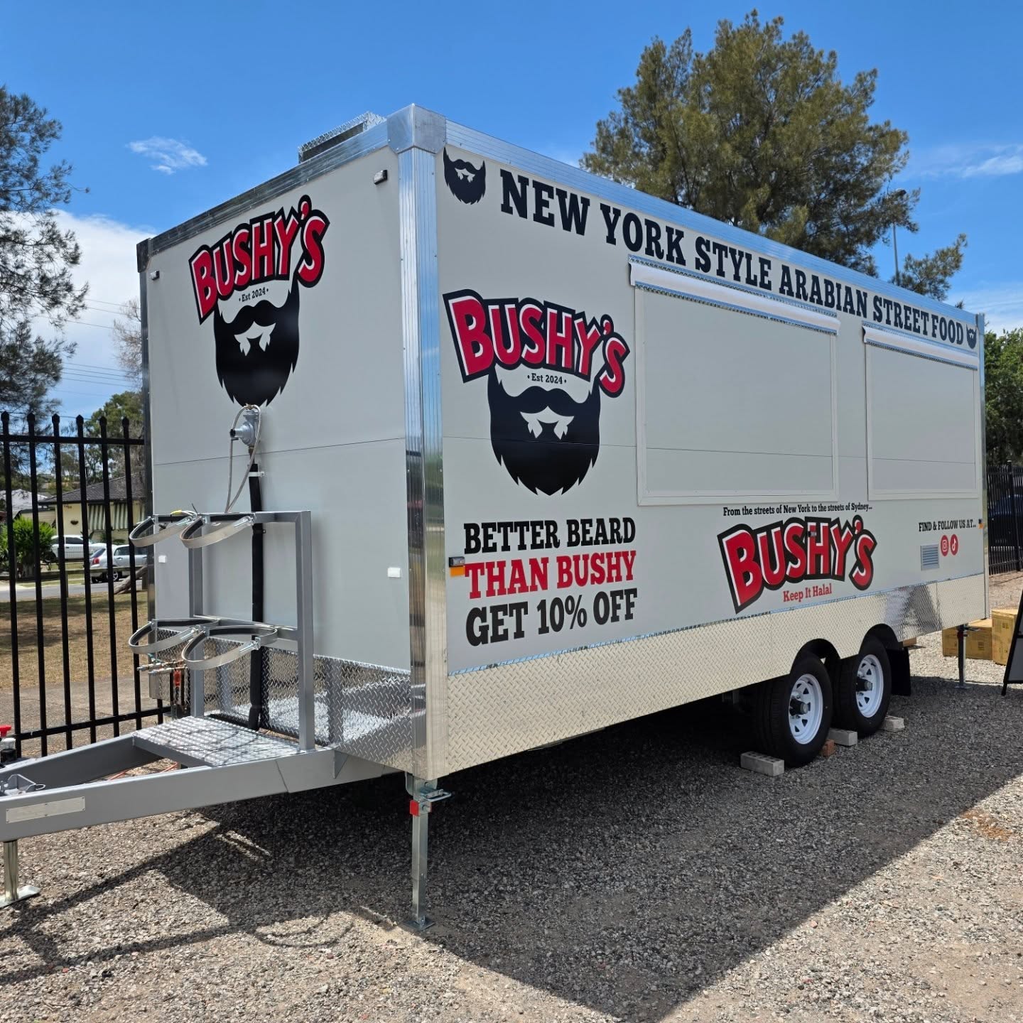 Bushy's New York style Arabian street food trailer built by Prestige Food Vans with dual serving windows and bold logo branding