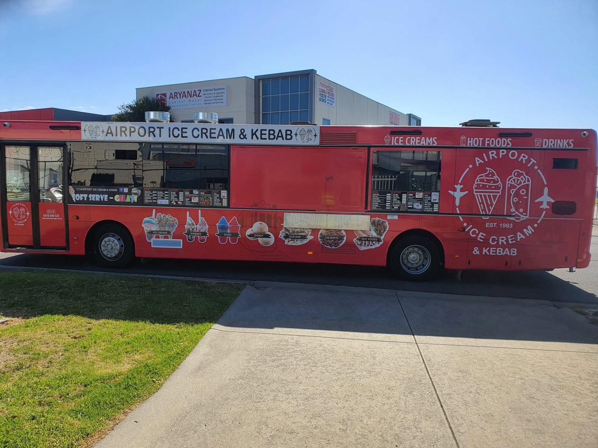 Airport Ice Cream and Kebab converted bus built by Prestige Food Vans with full red wrap and dual serving windows